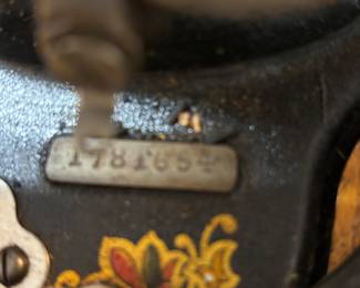 * #103 White sewing machine with lid serial #1781654 $60.00
