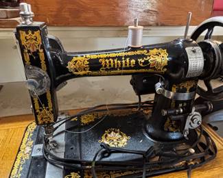 * #103 White sewing machine with lid serial #1781654 $60.00