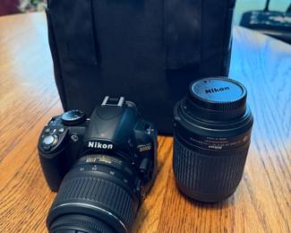 #106 Nikon D3100 includes extra lens and case $125.00