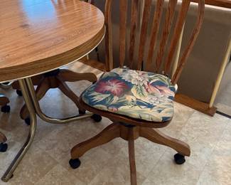 #55 Table with 4 rolling chairs with 1 leaf 48-60x36x29.5 $100.00