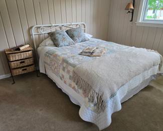 Bed and a wicker table