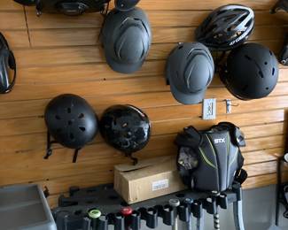 Assorted helmets and sporting Equipment