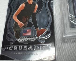 4 UNGRADED, AND ONE GRADED LAMELO BALL BASKETBALL CARDS
