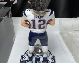 RARE TOM BRADY BOBBLEHEAD NEW IN BOX. LIMITED EDITION WITH CHAMPIONSHIP RING BASE. NUMBERED NFL OFFICIAL