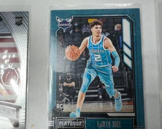 4 UNGRADED, AND ONE GRADED LAMELO BALL BASKETBALL CARDS