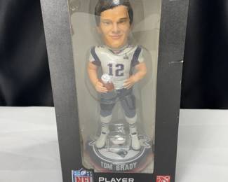RARE TOM BRADY BOBBLEHEAD NEW IN BOX. LIMITED EDITION WITH CHAMPIONSHIP RING BASE. NUMBERED NFL OFFICIAL