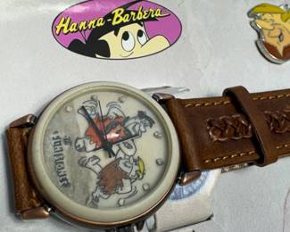 VINTAGE HANNAH BARBERA FLINTSTONES/FOSSIL COLLABORATION WATCH AND BARNEY LAPEL PIN IN ORIGINAL TIN