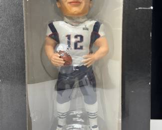 RARE TOM BRADY BOBBLEHEAD NEW IN BOX. LIMITED EDITION WITH CHAMPIONSHIP RING BASE. NUMBERED NFL OFFICIAL