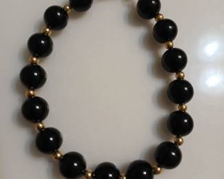 14kt and onyx bead bracelet.