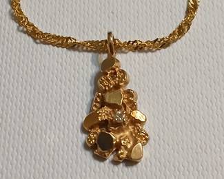 14kt gold nugget chain .