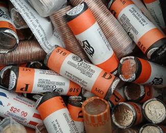 Huge selection of uncirculated dollar coins and state quarters.