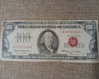 Red seal 100 dollar silver note.