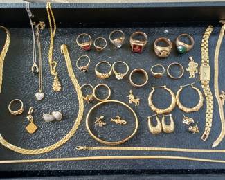 Huge assortment of 10 and 14karat gold men's and women's jewelry.