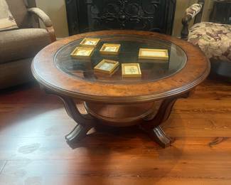 Glass top cocktail table