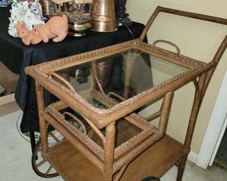 Vintage wicker bar cart