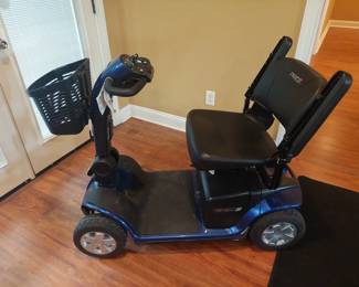 Pride Victory outside, four-wheel scooter; again, like new