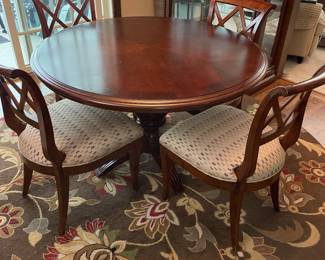 Beautiful kitchen table and chairs, very nice round floor rug