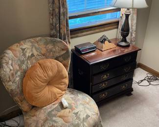 One of two chairs, nightstand, and lamp