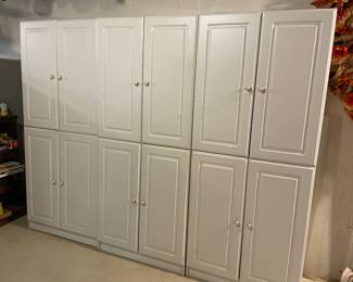 Three of the five very nice wall cabinets