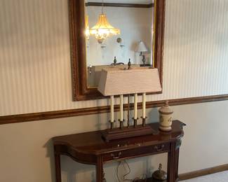Large wall mirror and side table