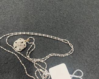 Sterling silver sand dollar necklace