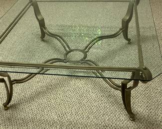 Large glass top metal base coffee table