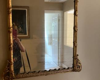 Ornate gold wall mirror