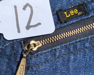NOTICE: THE LEE JACKETS ARE BEING SOLD ON A BIDDING SYSTEM - place your max bid on #1 - #13 in person or by calling 989-600-8192
13 Lee denim jackets - Three are unlined
Four are quilted lining 
Six are flannel lined 