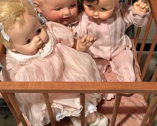Three Antique Full Size Baby Dolls in Crib