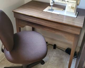 Singer Sewing Machine with cabinet! Chair sold separately.