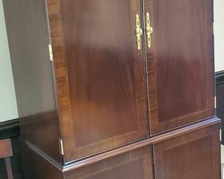 This piece is artfully made! Look at the hinges and handles. The inside has been modified to include shelved and drawers.