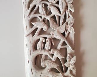 Great craving of a group of parrots in their native environment. This piece is totally carved!