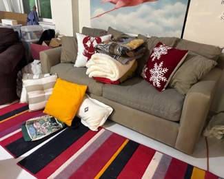 Sofa, blankets, throw pillows