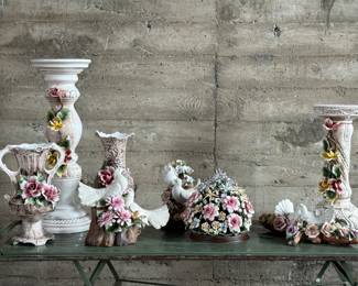 This lot features a large collection of Capodimonte porcelain, all with minor flaws or wear. The tallest piece measures, 31.5” H x 12” W x 12” D. Capodimonte porcelain, soft-paste porcelain produced by a factory established in 1743 at the Palazzo of Capodimonte by Charles III of Naples. Ware was produced there in large quantity and wide variety until 1759, when the concern was dismantled and removed to Buen Retiro, near Madrid, when Charles became king of Spain. No in-house shipping available. All items in this lot have noticeable chips, minor damage, etc. 