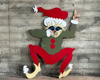 A wacky wood carving! This specimen measures, 69” H x 45” W.