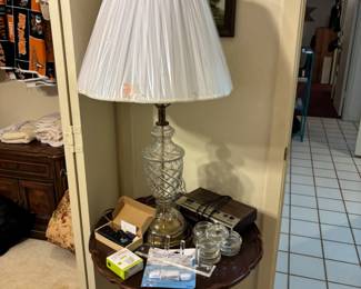 The home has a selection of table lamps and side tables.