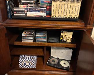 A box of 45's and CD's