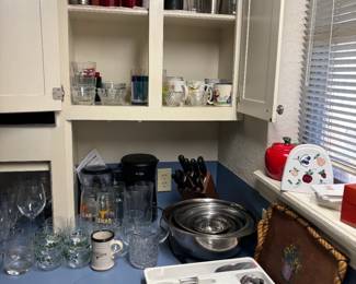 Glassware and coffee mugs.