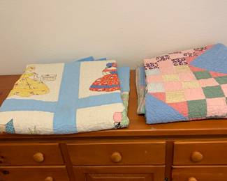 Very nice multiple quilts. Some not shown, doilies as well