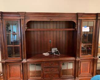 Four piece entertainment center.
10’ 1” long
7’ 2” Tall
22.5” Deep
2 side pieces are 2’ 1” wide
Middle Section 6’ 1 “ long
Shelf in middle section 5’ 6” long