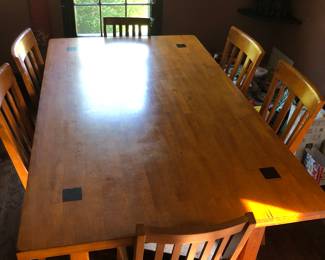 Craftsman style, solid wood table, seats six. Priced to move.