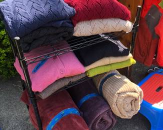 Some gently or never worn women’s clothing, as well as kids, and several very nice throw blankets - all nicely priced!
