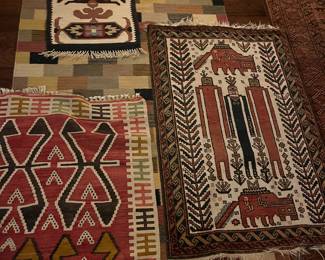 variety of kilim and other style rugs, notice very special find of American Indian rug at right - rare piece, also have beautiful vintage Turkish prayer rug for sale...