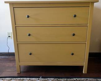 3-drawer dresser, like new, lovely and unique shade of yellow, quality materials and build, infinitely useful