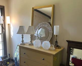 variety of lamps, mirrors, some other artwork