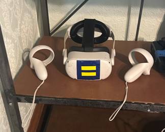 Oculus VR with two handled remotes, meta quest 2, oculus quest two