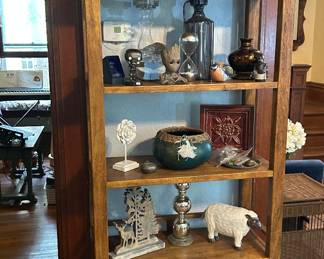 Wooden Bookshelf with animals, and budhas