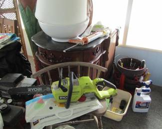chain saw & bathroom vanity w/ sink