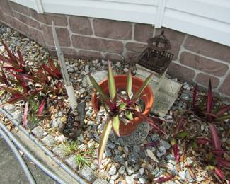 outdoor lighthouse decor and plant