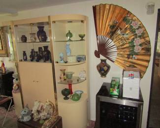 Asian statues, wine refrigerator